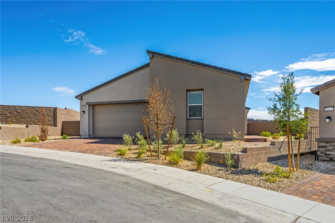 1670 Capri Falls Court, Henderson, NV 89011 Clean architectural lines and desert landscaping define this modern single-story residence.