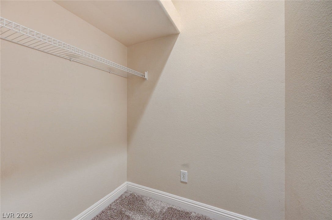 8 Starbrook Drive, Henderson, NV 89052 Ample wire shelving and soft carpeting maximize the utility of this closet space.
