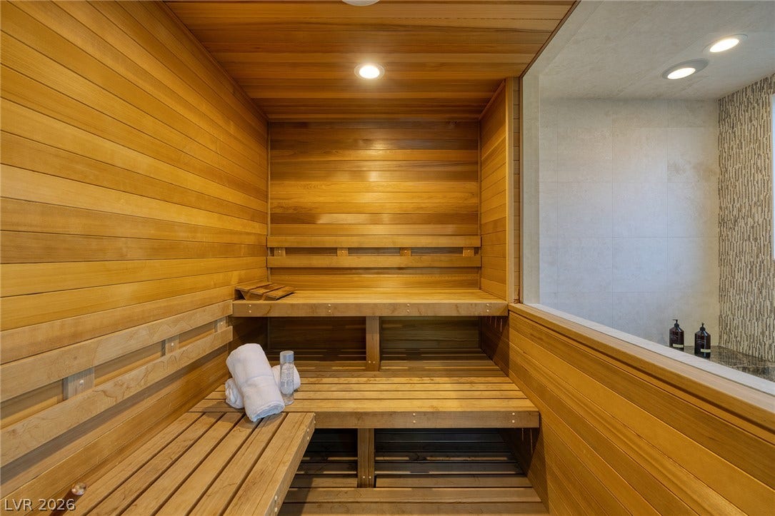 761 Dragon Ridge Drive, Henderson, NV 89012 Rich cedar paneling and built-in bench seating define this relaxing private home sauna.