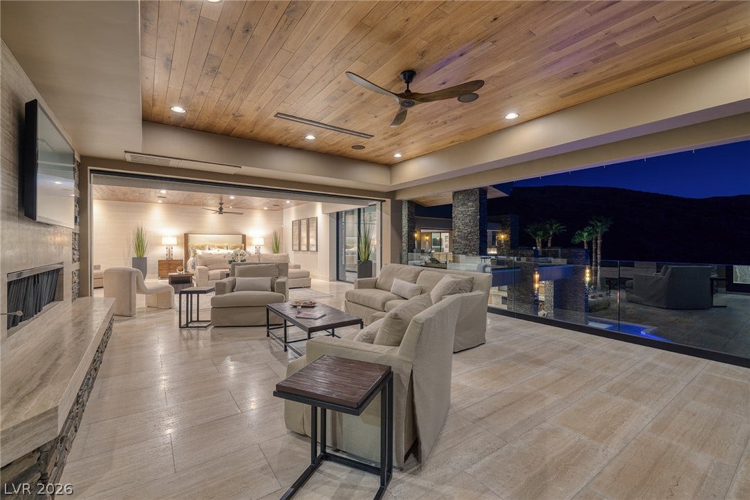 761 Dragon Ridge Drive, Henderson, NV 89012 Gleaming tile floors and warm wood ceilings define this indoor-outdoor entertaining area.