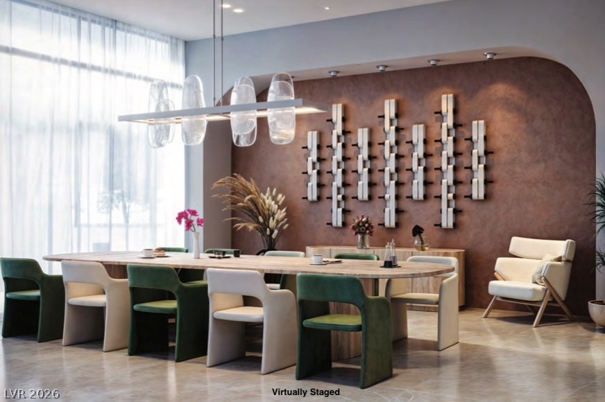 "Virtually Staged" An arched alcove wall and tile flooring anchor this expansive modern dining room.