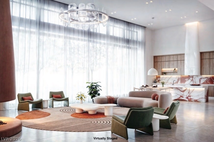 "Virtually Staged" Massive floor-to-ceiling windows and soaring ceilings define this modern open-concept living space.