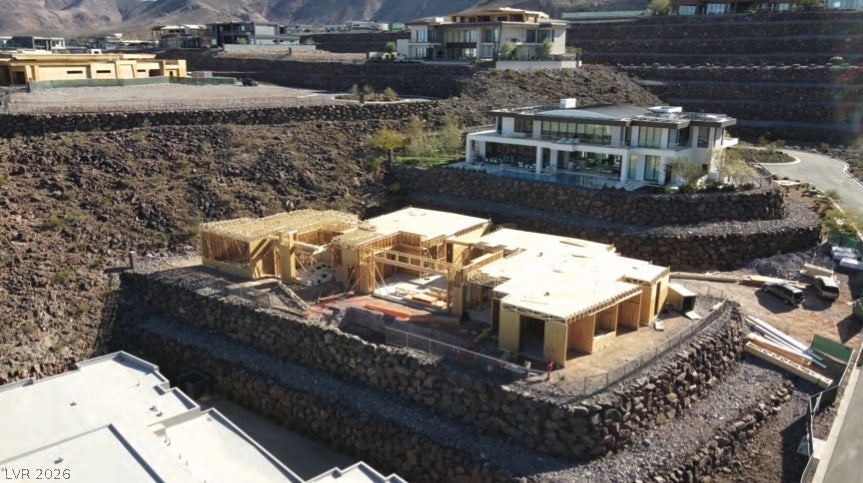 Dramatic hillside topography forms the backdrop for this multi-level residential development.