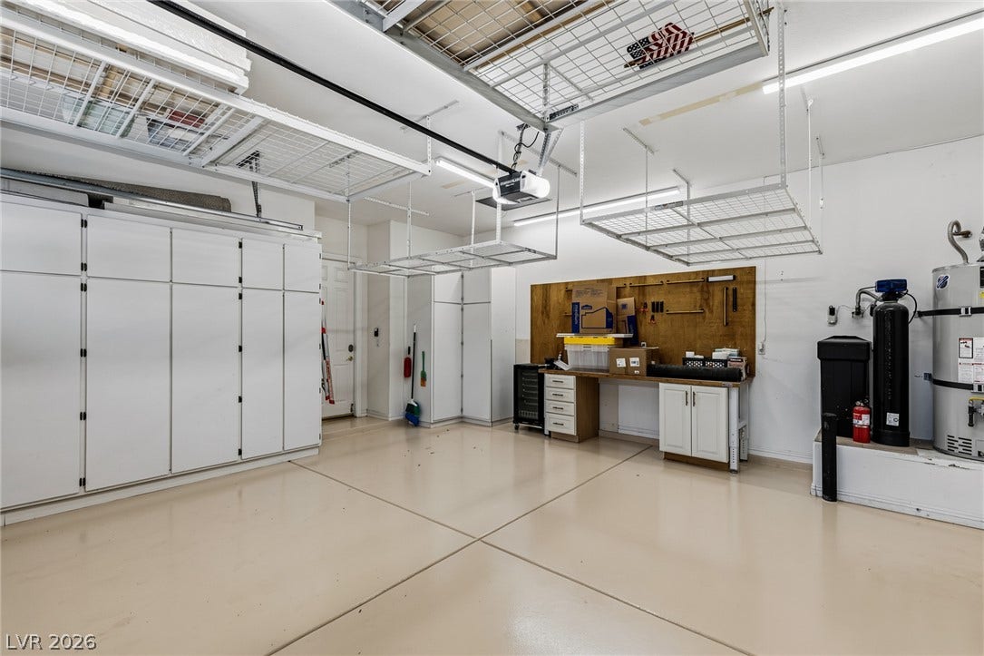 1201 Mersault Court, Las Vegas, NV 89144 An organized workspace and abundant storage solutions complete this functional utility area.