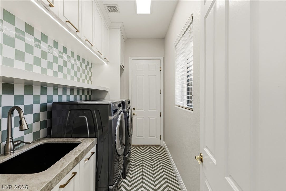 1201 Mersault Court, Las Vegas, NV 89144 Laundry room with cabinets / sink and convenient ice maker