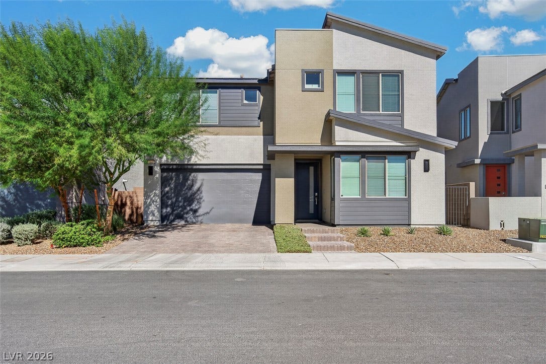 6849 Desert Finch Street, North Las Vegas, NV 89084 Sharp lines and modern architectural angles define this contemporary two-story home design.