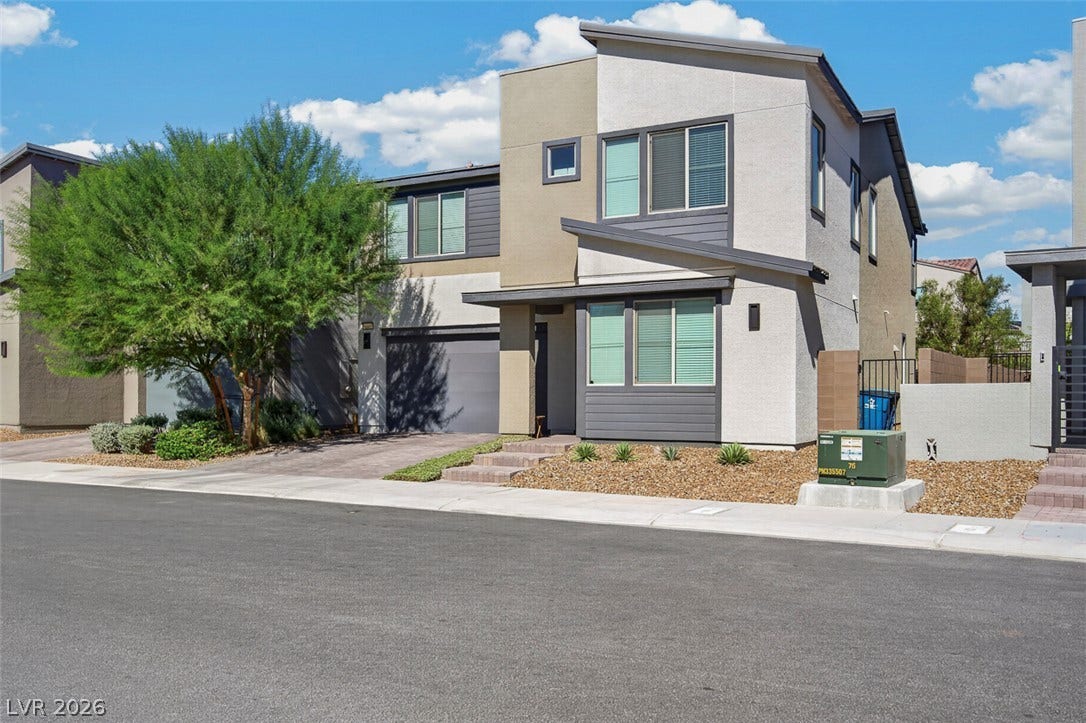 6849 Desert Finch Street, North Las Vegas, NV 89084 Striking contemporary lines and multi-textured facades define this modern two-story home.