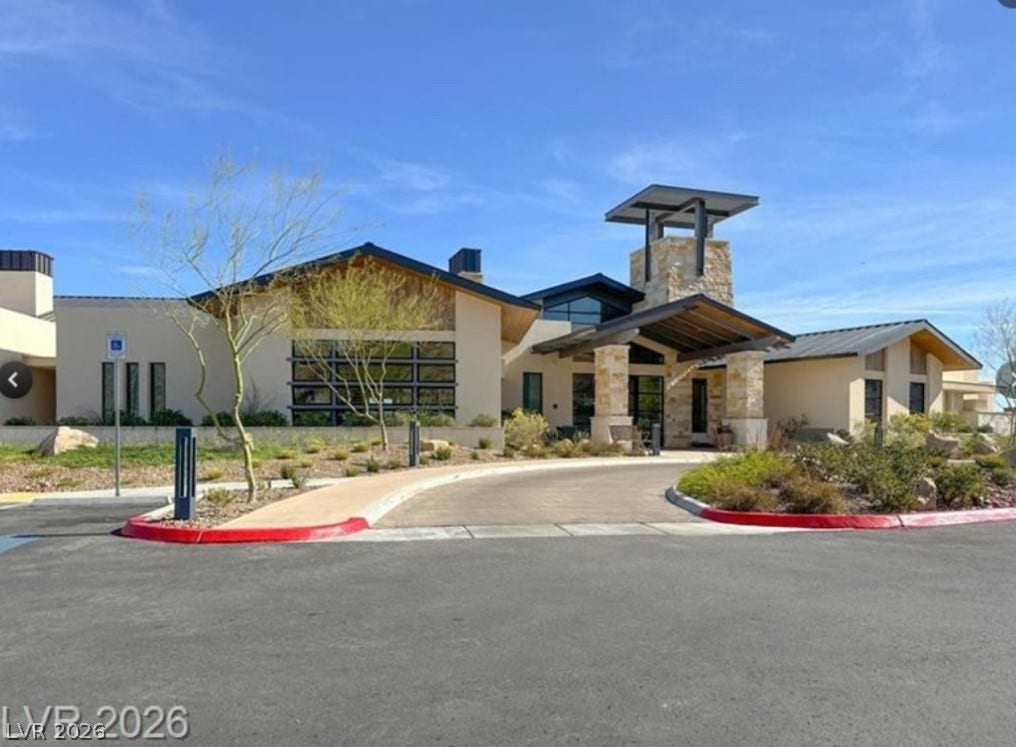 162 Palm Fox Court, Henderson, NV 89011 Bold geometric lines and stone pillars frame the architectural entryway of this modern desert estate.