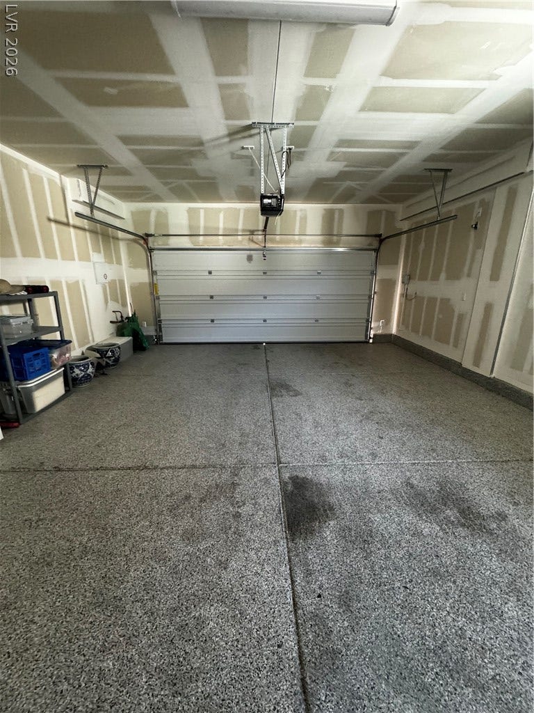 162 Palm Fox Court, Henderson, NV 89011 Functional garage storage features durable flooring and an automatic overhead door system.