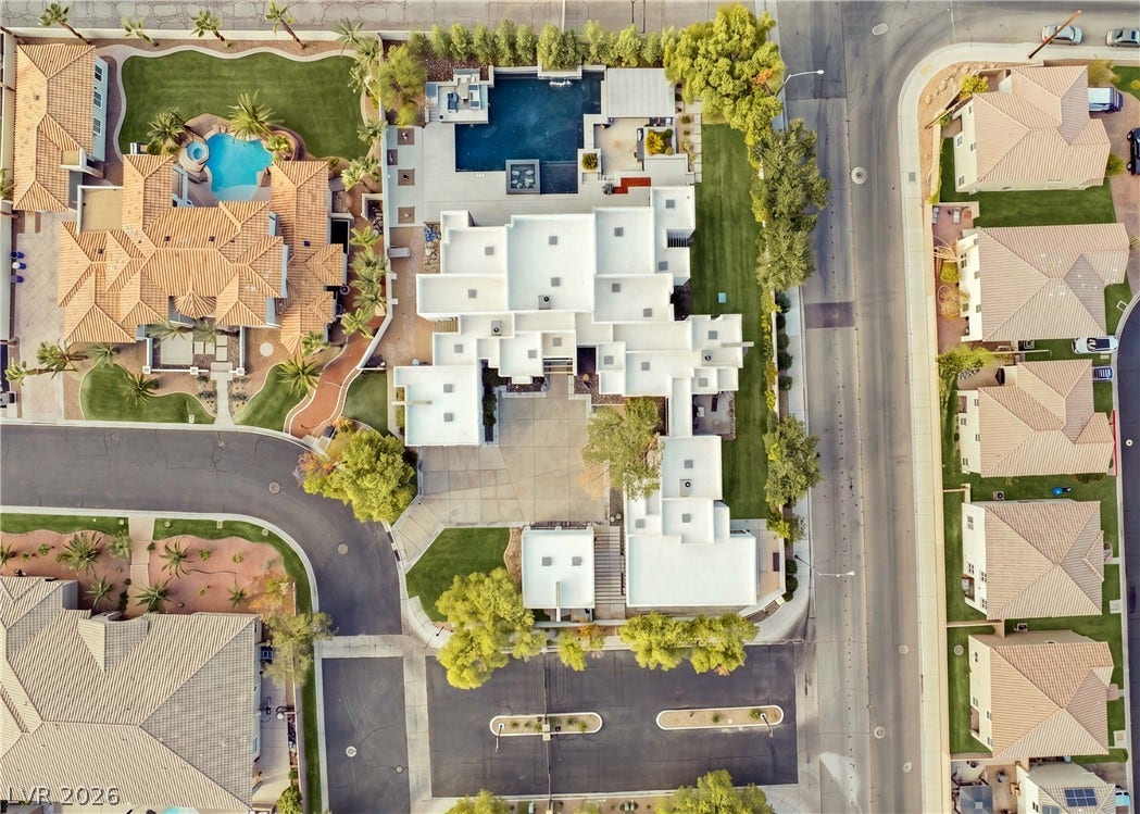 3716 Caesars Circle, Las Vegas, NV 89120 An aerial perspective reveals the expansive layout of this modern estate on a corner lot.