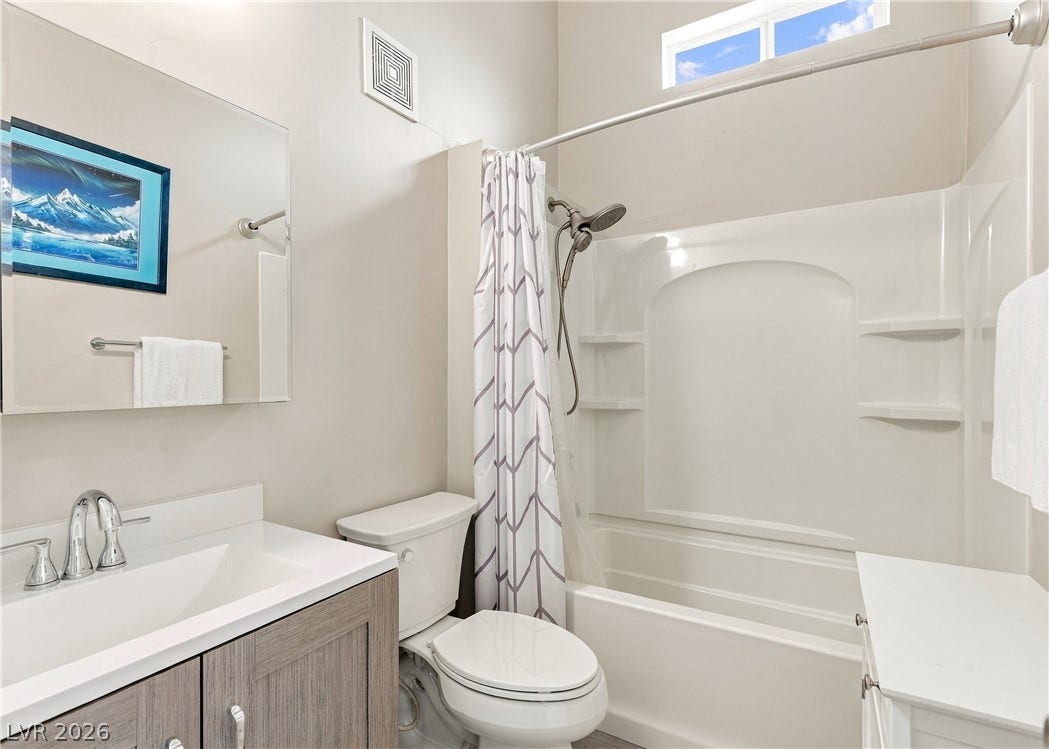 3716 Caesars Circle, Las Vegas, NV 89120 A high ceiling and clean lines define this modern bathroom space.