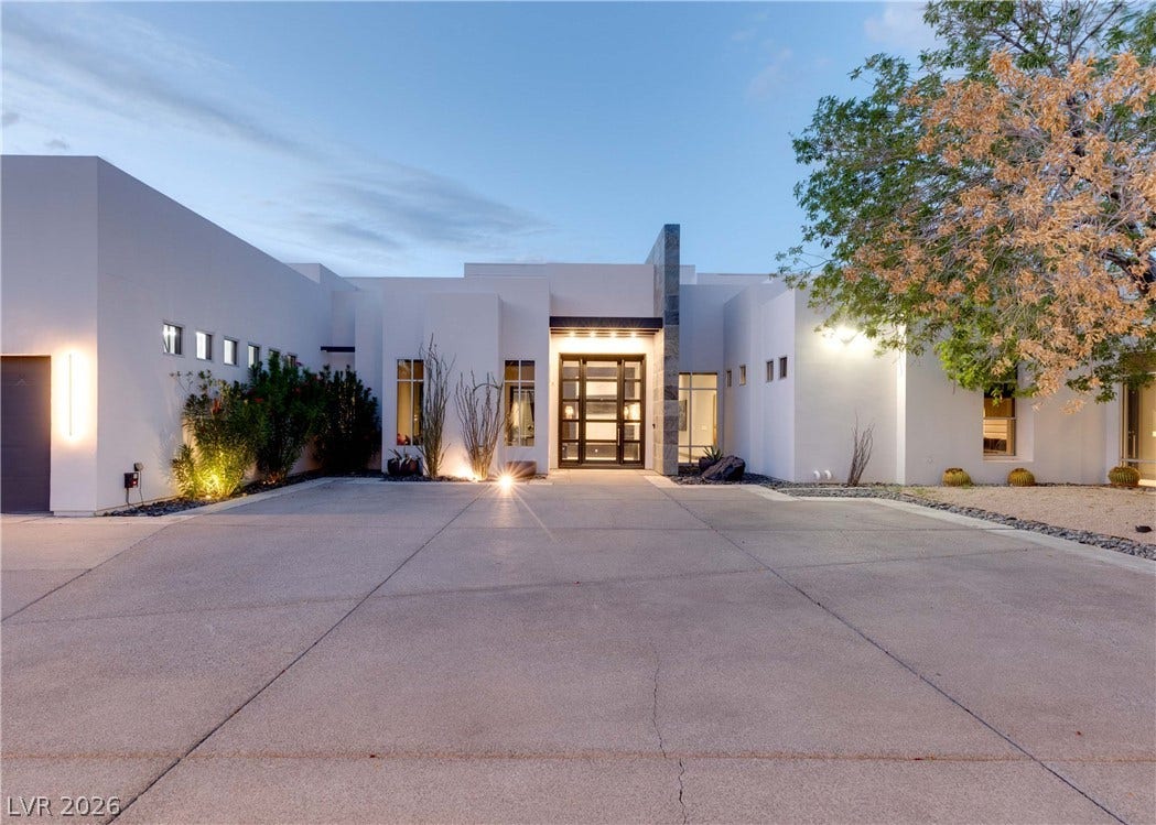 3716 Caesars Circle, Las Vegas, NV 89120 Bold geometric lines and smooth stucco define this striking contemporary desert residence.