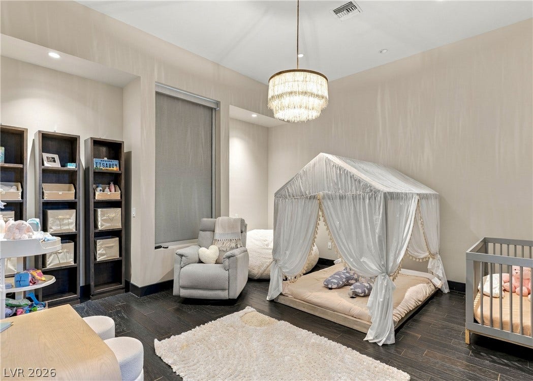 3716 Caesars Circle, Las Vegas, NV 89120 High ceilings and dark wood floors define this versatile space.