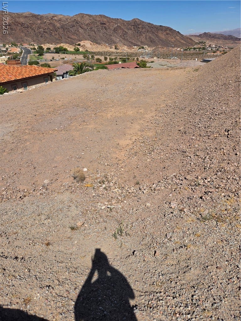 892 Jasper Way, Boulder City, NV 89005 Panoramic mountain and neighborhood views unfold from this elevated desert lot.