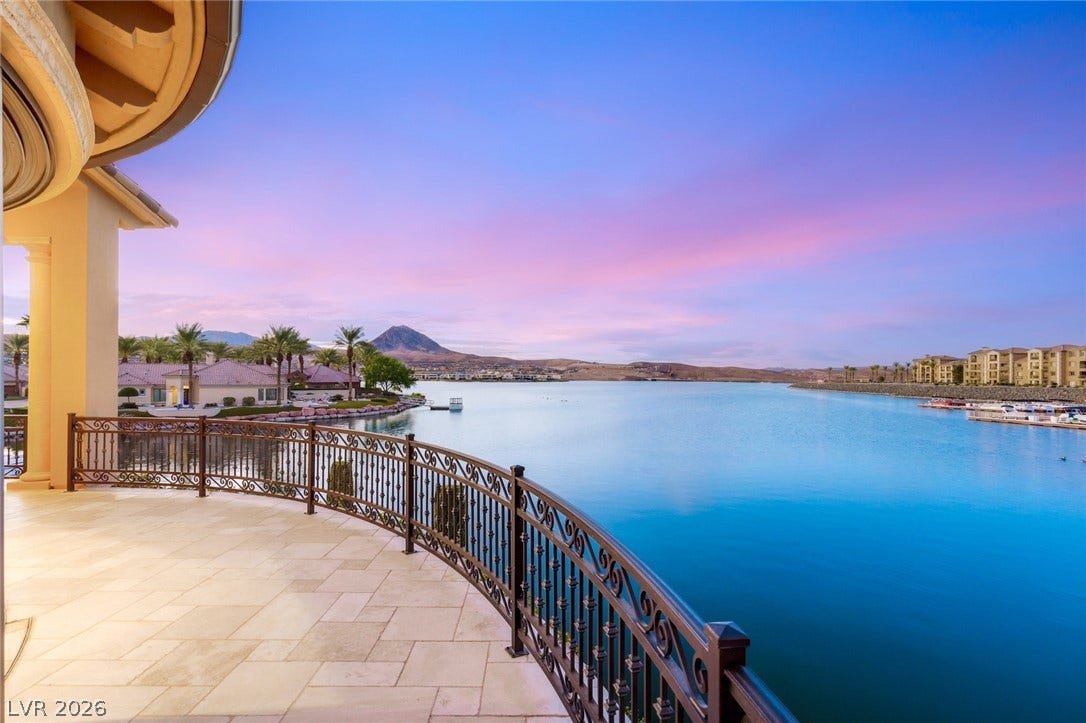 7 Lido Nord, Henderson, NV 89011 An elegant stone-paved terrace offers dramatic, sweeping views across the tranquil lakefront.