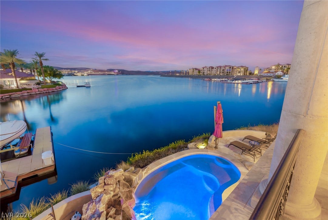7 Lido Nord, Henderson, NV 89011 Serene waterfront vistas expand past the private pool and custom stone details.