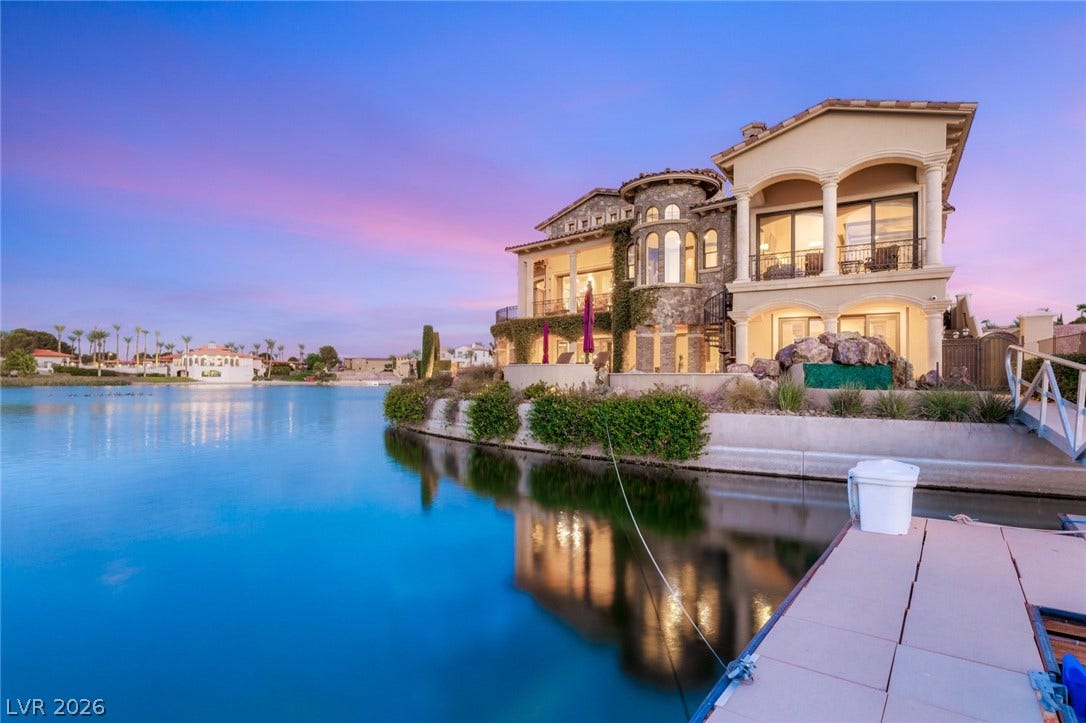 7 Lido Nord, Henderson, NV 89011 Elegant Mediterranean design shapes this multi-level waterfront residence with private dock access.