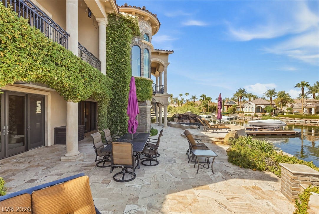7 Lido Nord, Henderson, NV 89011 Elegant stone paving and stately columns define this waterfront terrace overlooking a private dock.