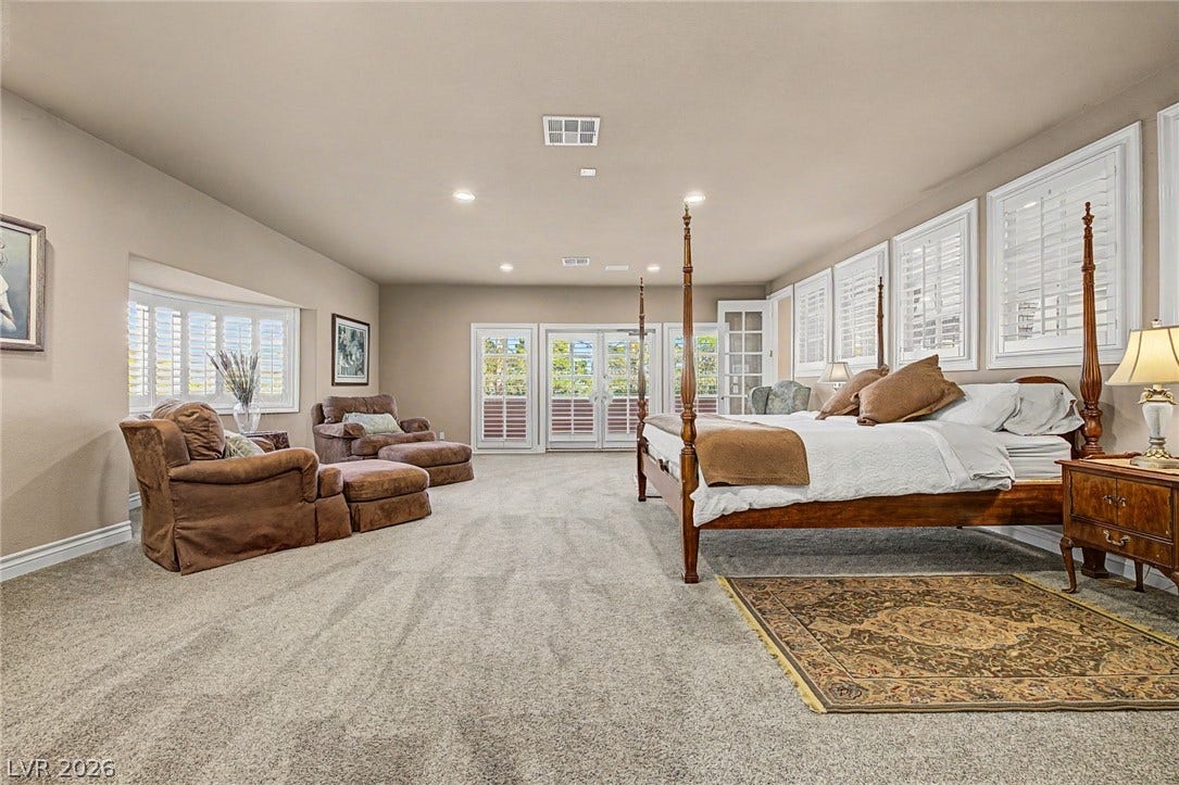 1105 Broadmoor Avenue, Las Vegas, NV 89109 Plentiful natural light fills a voluminous bedroom layout complete with French doors.
