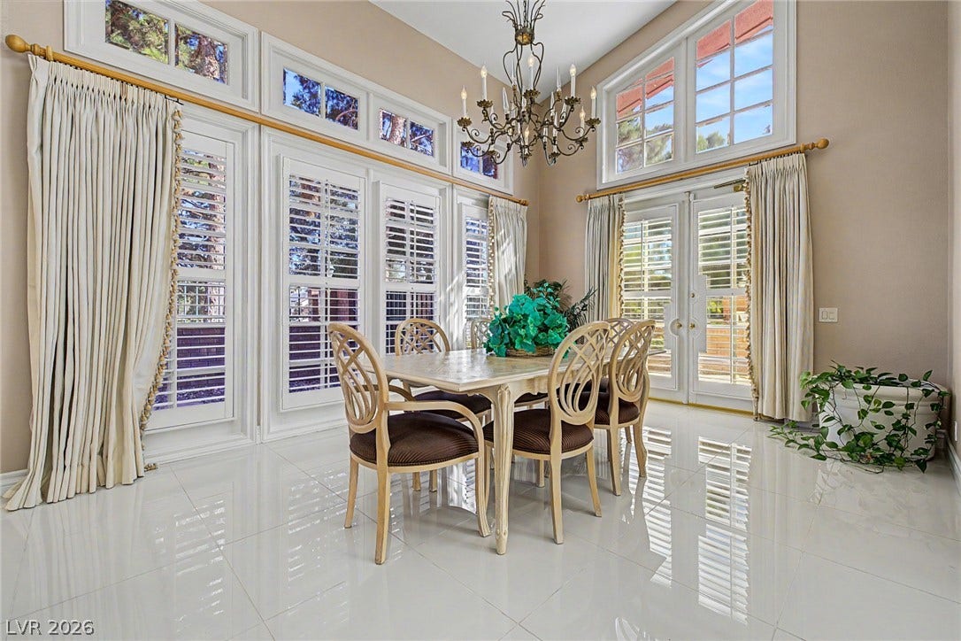 1105 Broadmoor Avenue, Las Vegas, NV 89109 Gleaming tile floors and soaring ceilings elevate this elegant dining space with abundant natural light.
