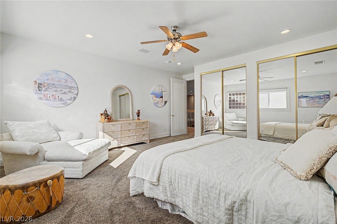 1105 Broadmoor Avenue, Las Vegas, NV 89109 Gleaming mirrored closet doors and recessed lighting highlight this comfortable main-level bedroom.