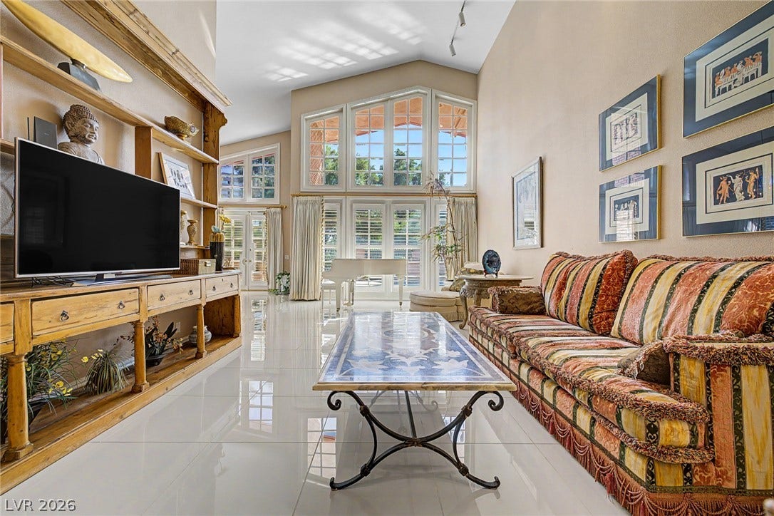 1105 Broadmoor Avenue, Las Vegas, NV 89109 Soaring vaulted ceilings and polished tile flooring define this architectural main living space.
