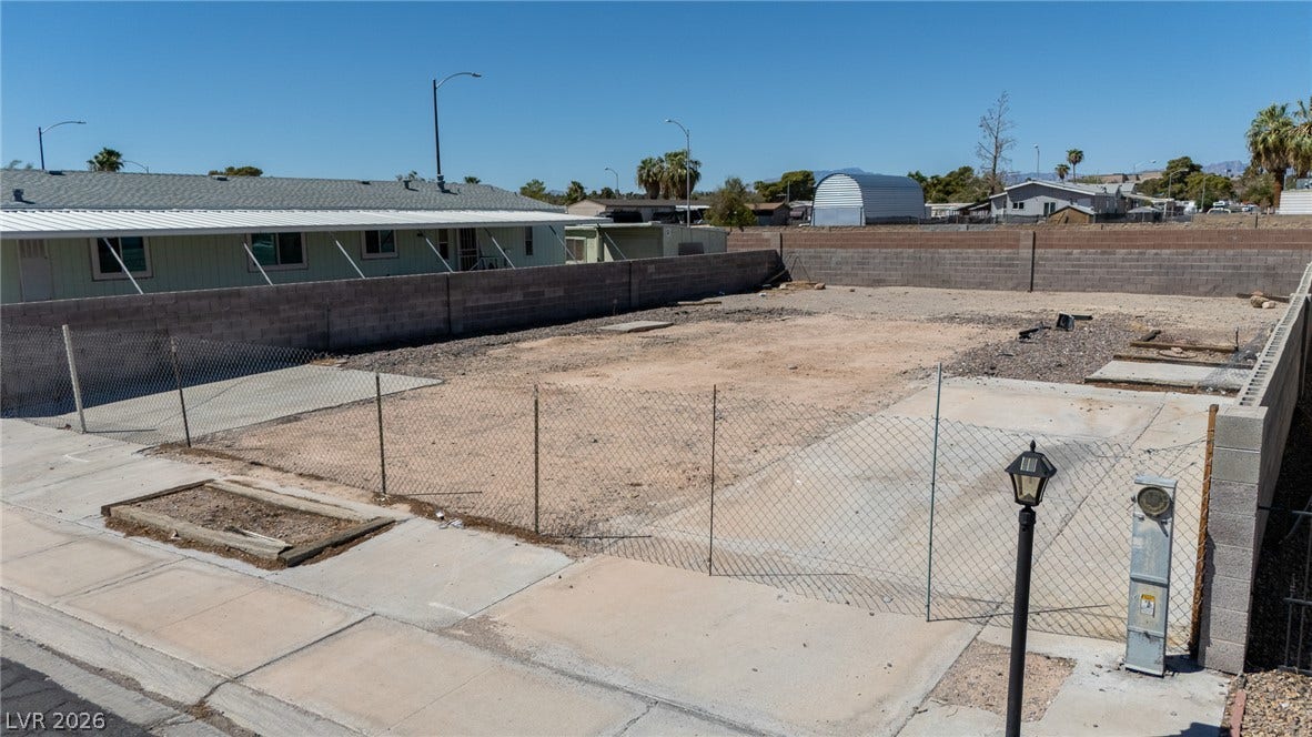 3499 Allegheny Drive, Las Vegas, NV 89122 A spacious level lot provides a blank slate for future construction projects.