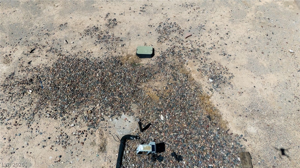 3499 Allegheny Drive, Las Vegas, NV 89122 A spacious unimproved lot provides a blank canvas ready for your custom build.