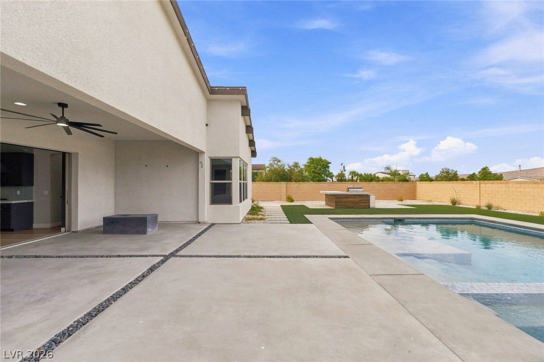 8380 Mojave Creek Court, Las Vegas, NV 89113 An inviting swimming pool and spacious patio provide the ultimate setting for outdoor living.