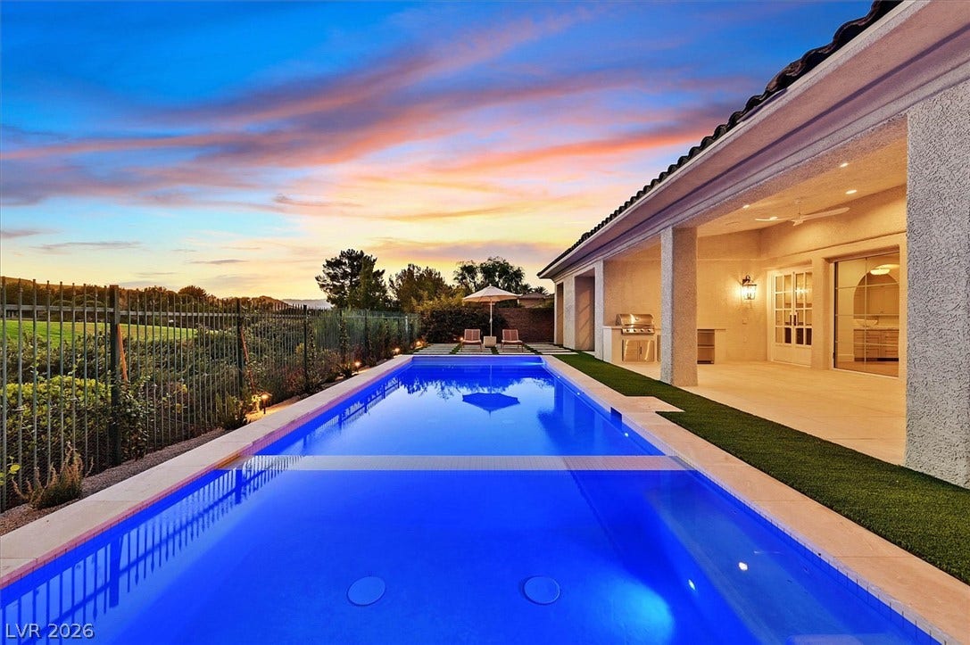 12007 Oakland Hills Drive, Las Vegas, NV 89141 A tranquil swimming pool sits alongside a covered patio overlooking scenic golf course views.