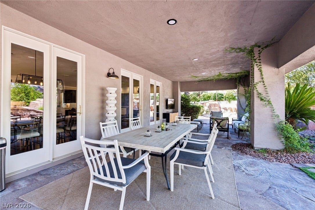 9916 Aspen Knoll Court, Las Vegas, NV 89117 Back patio as looking towards kitchen and family rooms.