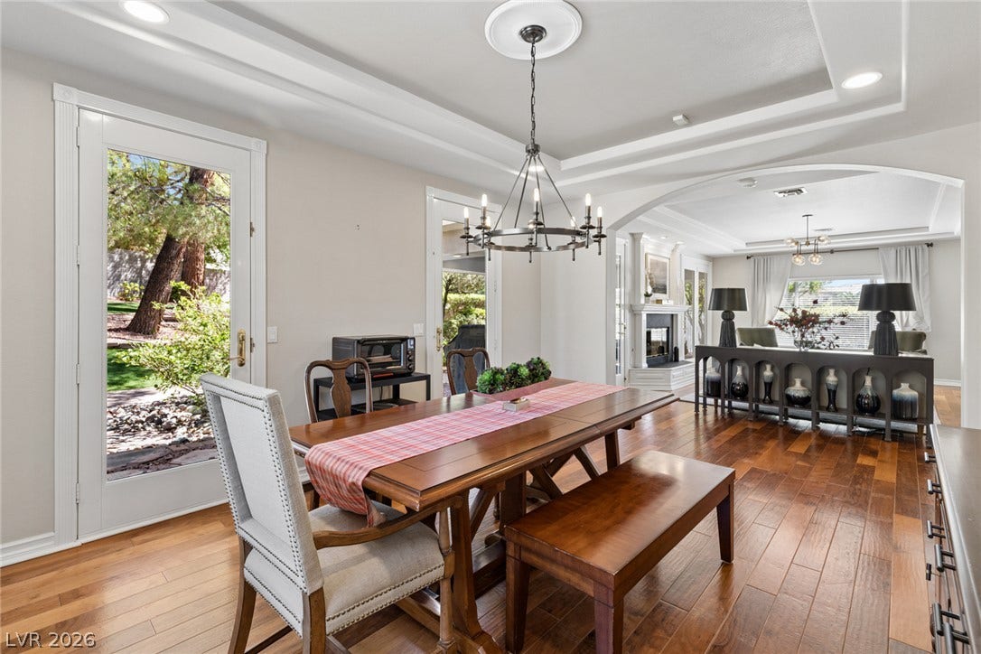 9916 Aspen Knoll Court, Las Vegas, NV 89117 Doors to patio add to this open-concept dining space.