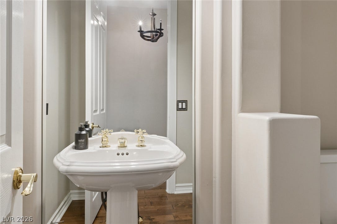 9916 Aspen Knoll Court, Las Vegas, NV 89117 1st level powder room vanity.