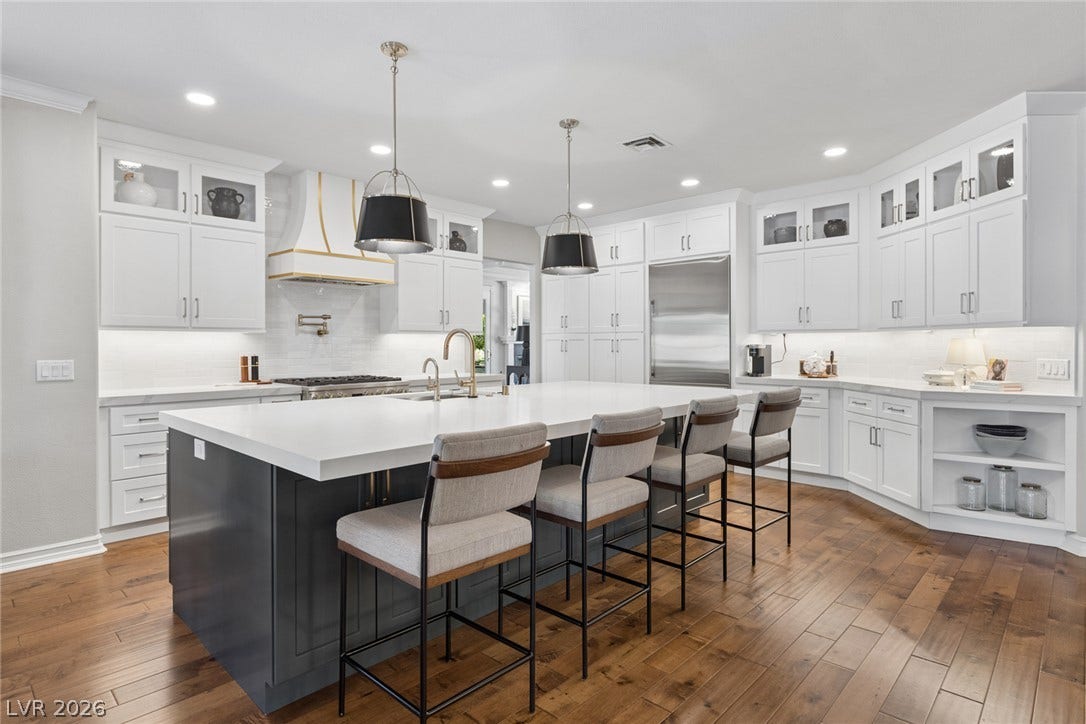 9916 Aspen Knoll Court, Las Vegas, NV 89117 Central island anchors this gourmet culinary space.