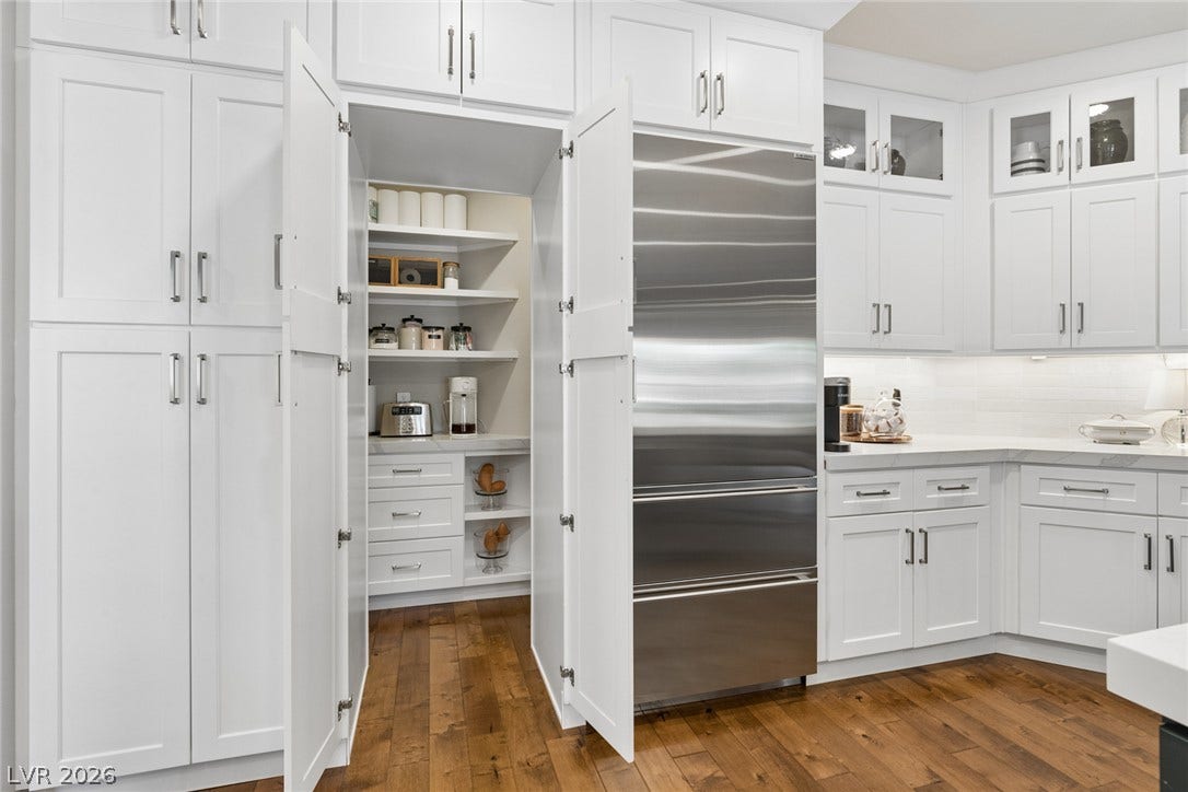 9916 Aspen Knoll Court, Las Vegas, NV 89117 Hidden coffee niche at walk in pantry with auto lighting and more storage.