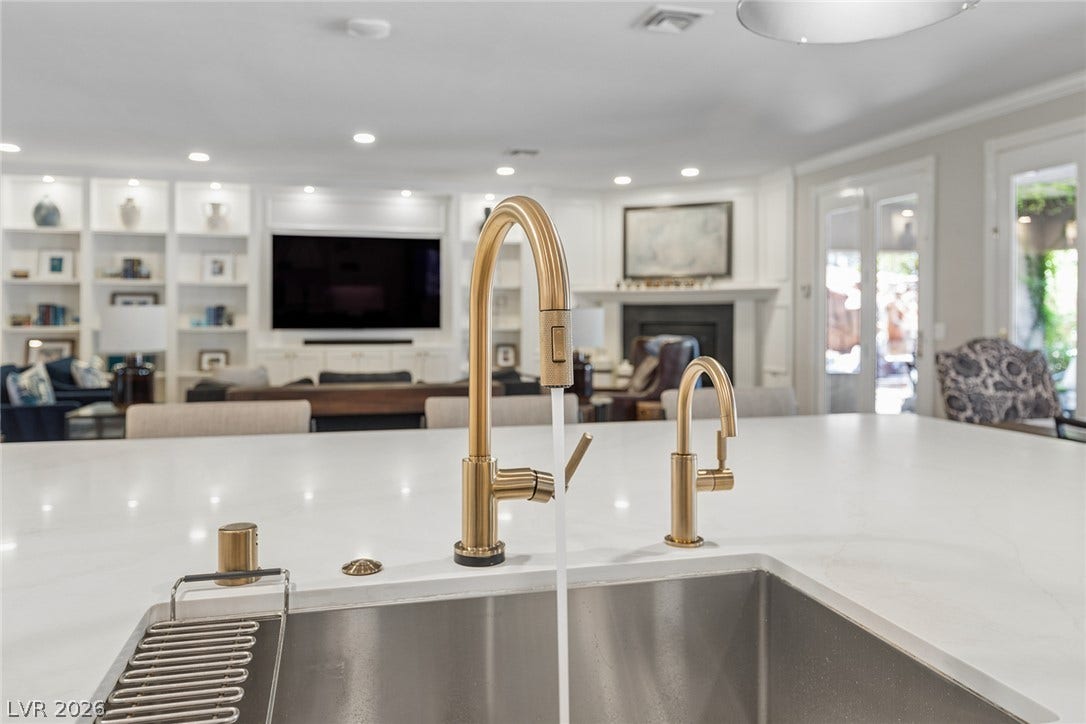9916 Aspen Knoll Court, Las Vegas, NV 89117 At kitchen sink.