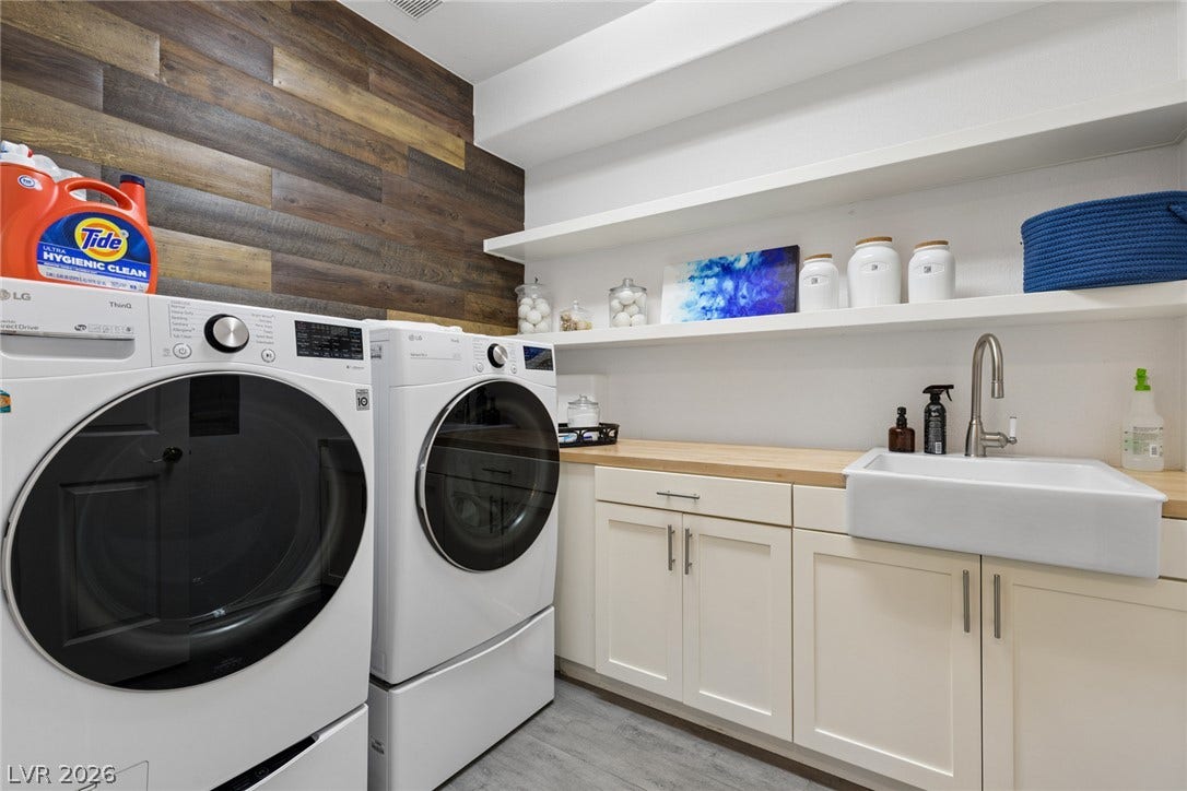 9916 Aspen Knoll Court, Las Vegas, NV 89117 Functional workspace highlights this utility area equipped with a deep basin and ample cabinetry.