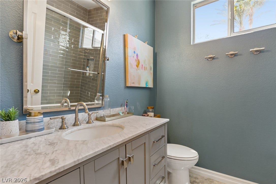 9916 Aspen Knoll Court, Las Vegas, NV 89117 First level guest bath between two downstairs bedrooms.