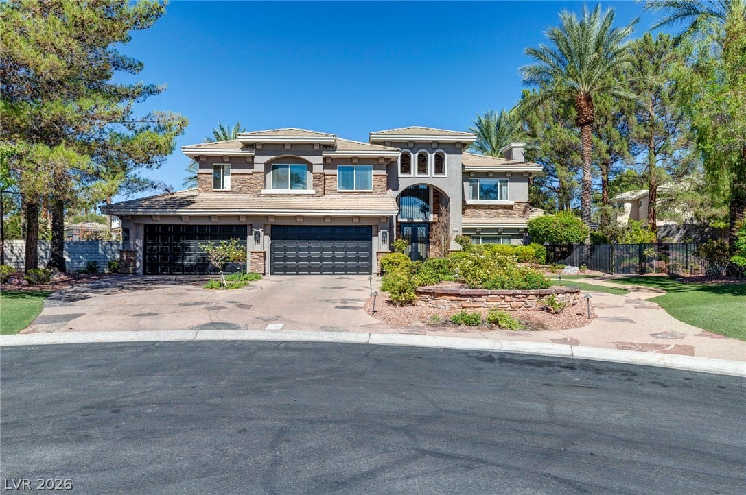 9916 Aspen Knoll Court, Las Vegas, NV 89117 Stately architecture defines this multi-level residence framed by mature palm trees. Stone driveway & cooled 4 car garage add to ambiance.