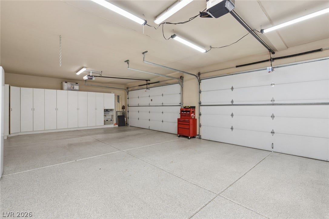 9916 Aspen Knoll Court, Las Vegas, NV 89117 Cooled spacious four car garage with storage .