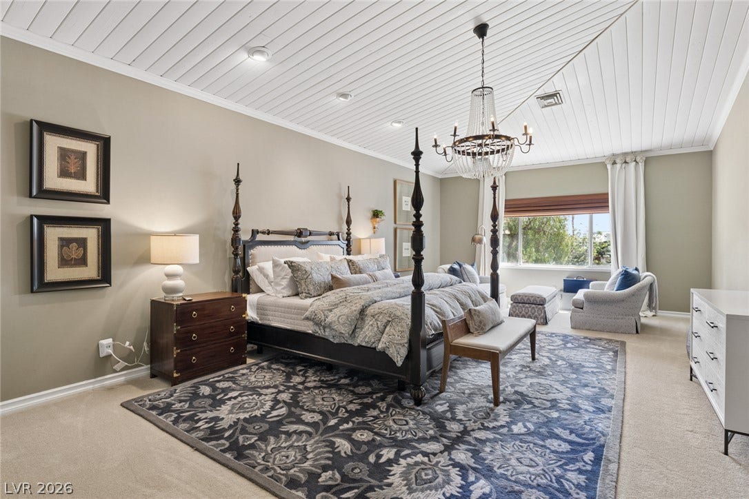 9916 Aspen Knoll Court, Las Vegas, NV 89117 Planked ceilings and a classic chandelier bring architectural distinction to this restful suite.