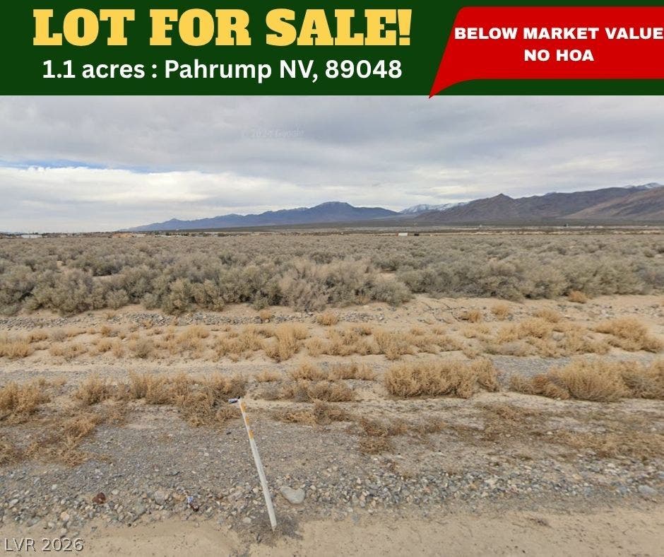 Distant mountains frame this open desert acreage offering classic southwestern views.