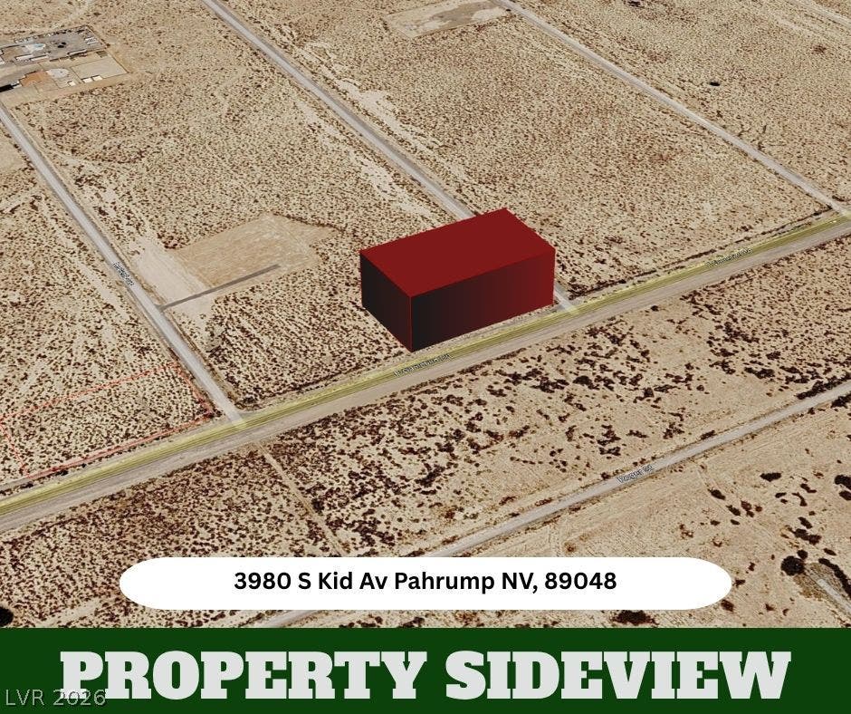 An aerial perspective highlights the vast desert landscape surrounding this undeveloped parcel.
