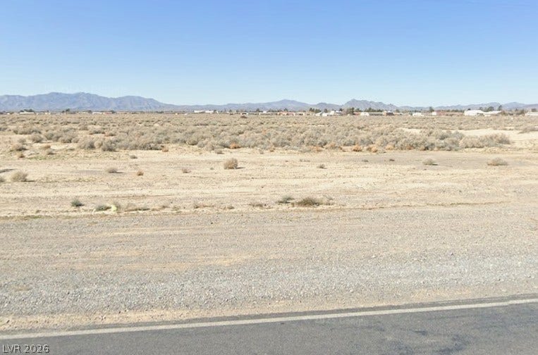 2190 S Highland Avenue, Pahrump, NV 89048 Distant mountains frame the expansive desert horizon of this open building lot.