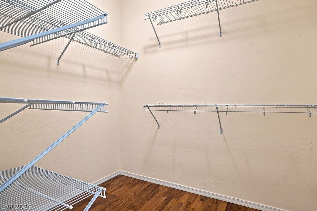 3432 Herring Gull Lane, North Las Vegas, NV 89084 Organized storage abounds within this walk-in closet in primary en-suite