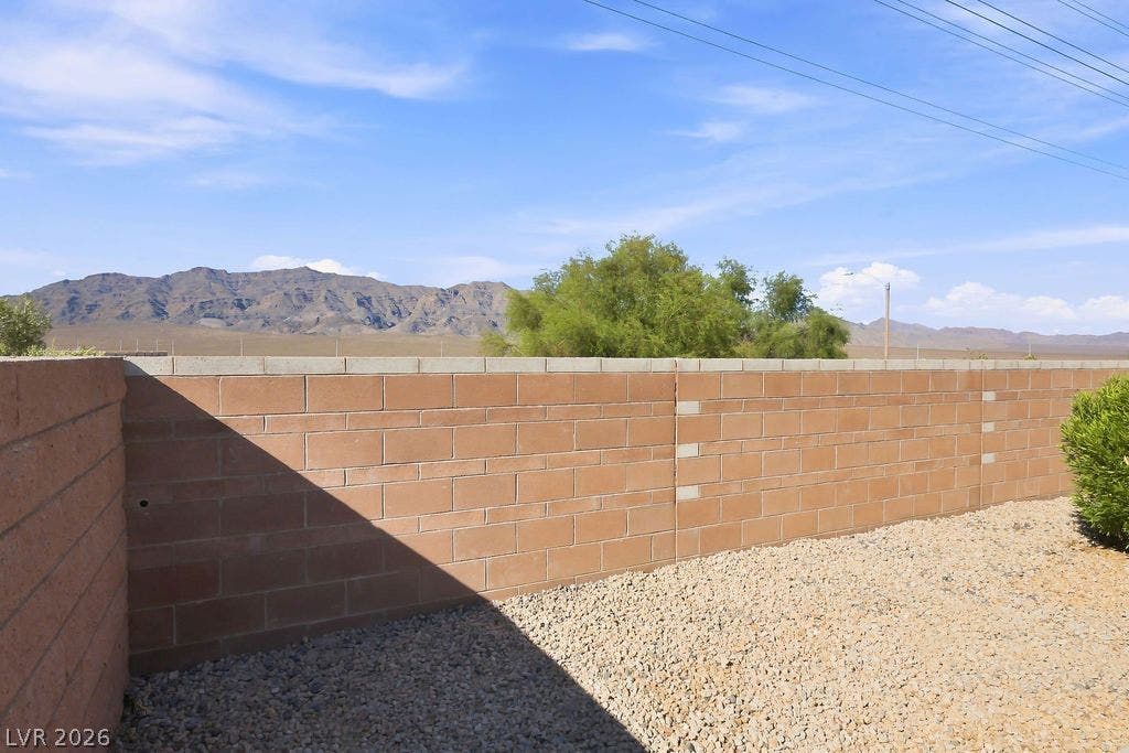 3432 Herring Gull Lane, North Las Vegas, NV 89084 Fully enclosed backyard with view to mountains.