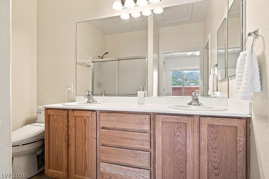 3432 Herring Gull Lane, North Las Vegas, NV 89084 En-suite Primary Bathroom with 2 sinks and Bidet seat with remote control