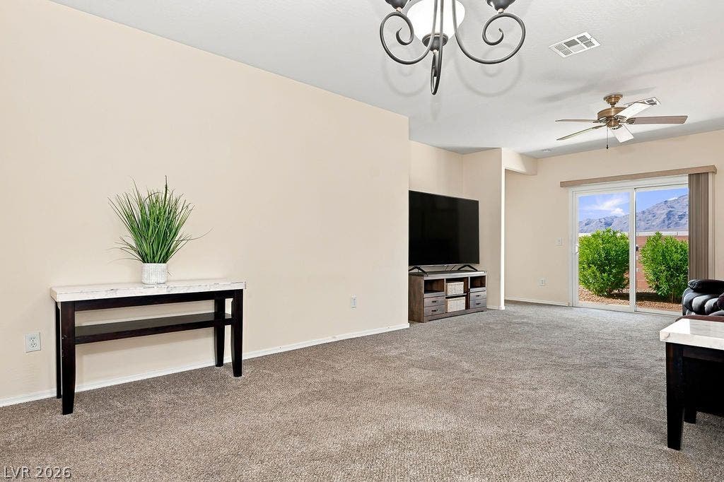 3432 Herring Gull Lane, North Las Vegas, NV 89084 Open Living with views of Mountains thru sliding patio doors.