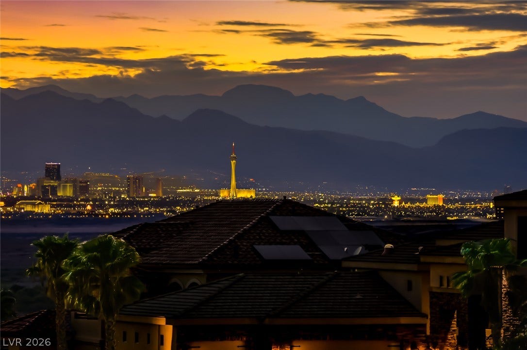 1157 Big Bird Court, Henderson, NV 89011 Golden sunset skies frame dramatic mountain backdrops and glittering city views.