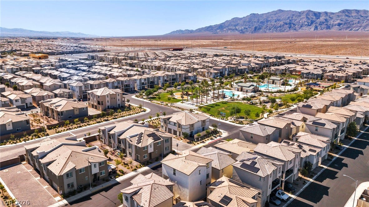 2594 Canary Yellow Court, North Las Vegas, NV 89086 Sweeping mountain vistas frame this master-planned desert community featuring a central park and pool.